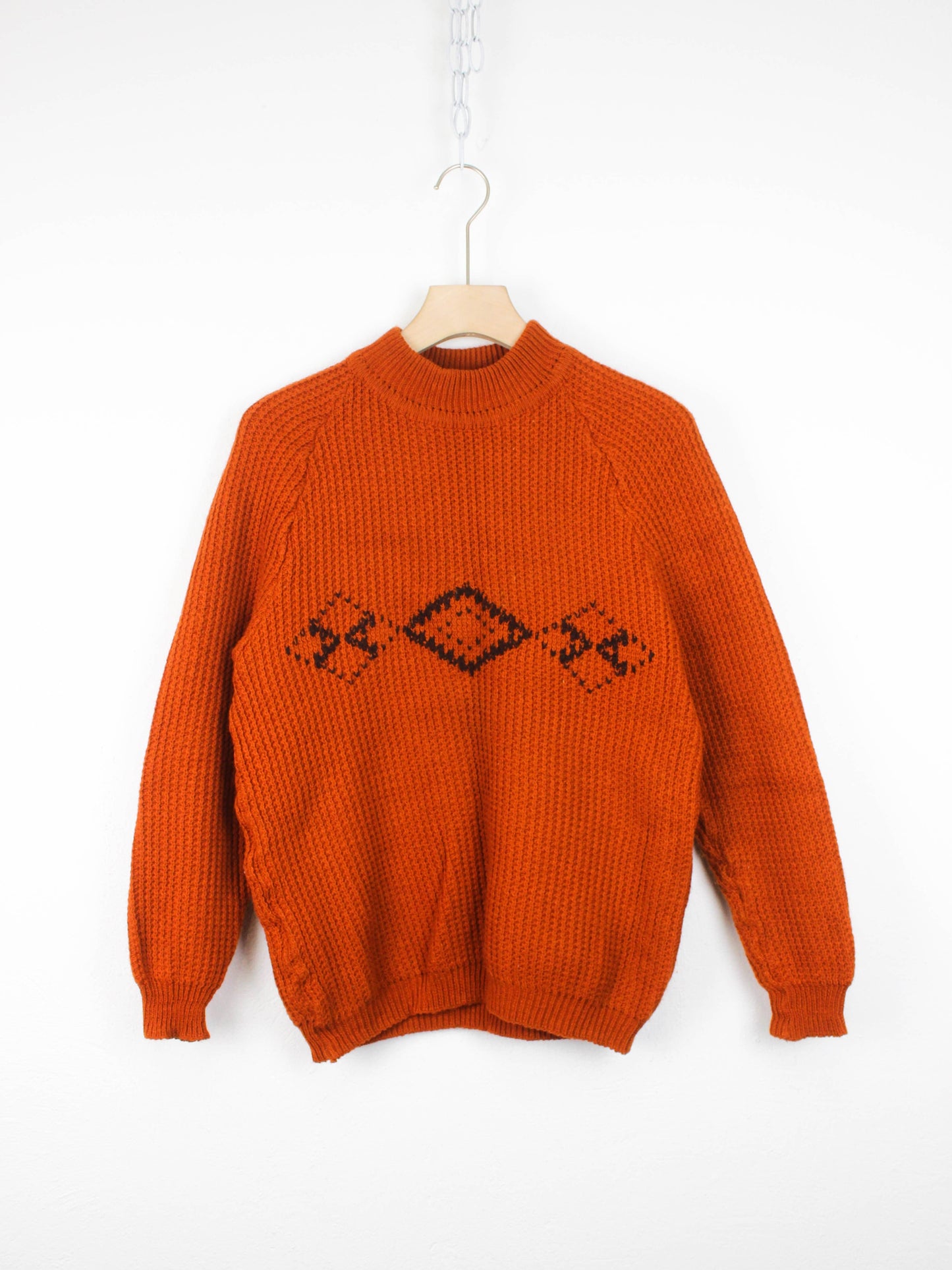 Вʼязаний вінтажний светр кольору моркви