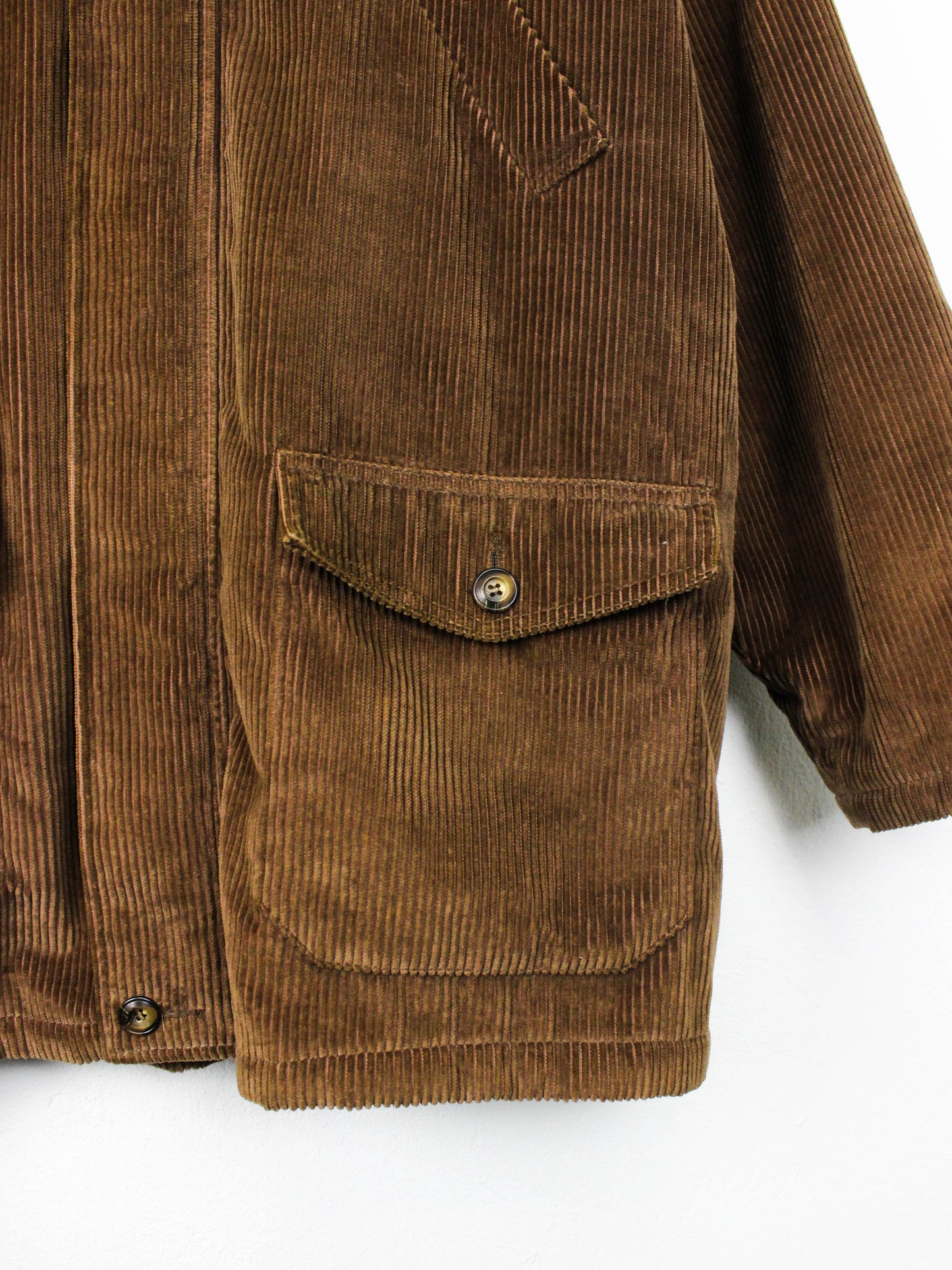 Коричнева вельветова куртка з вовняною підкладкою