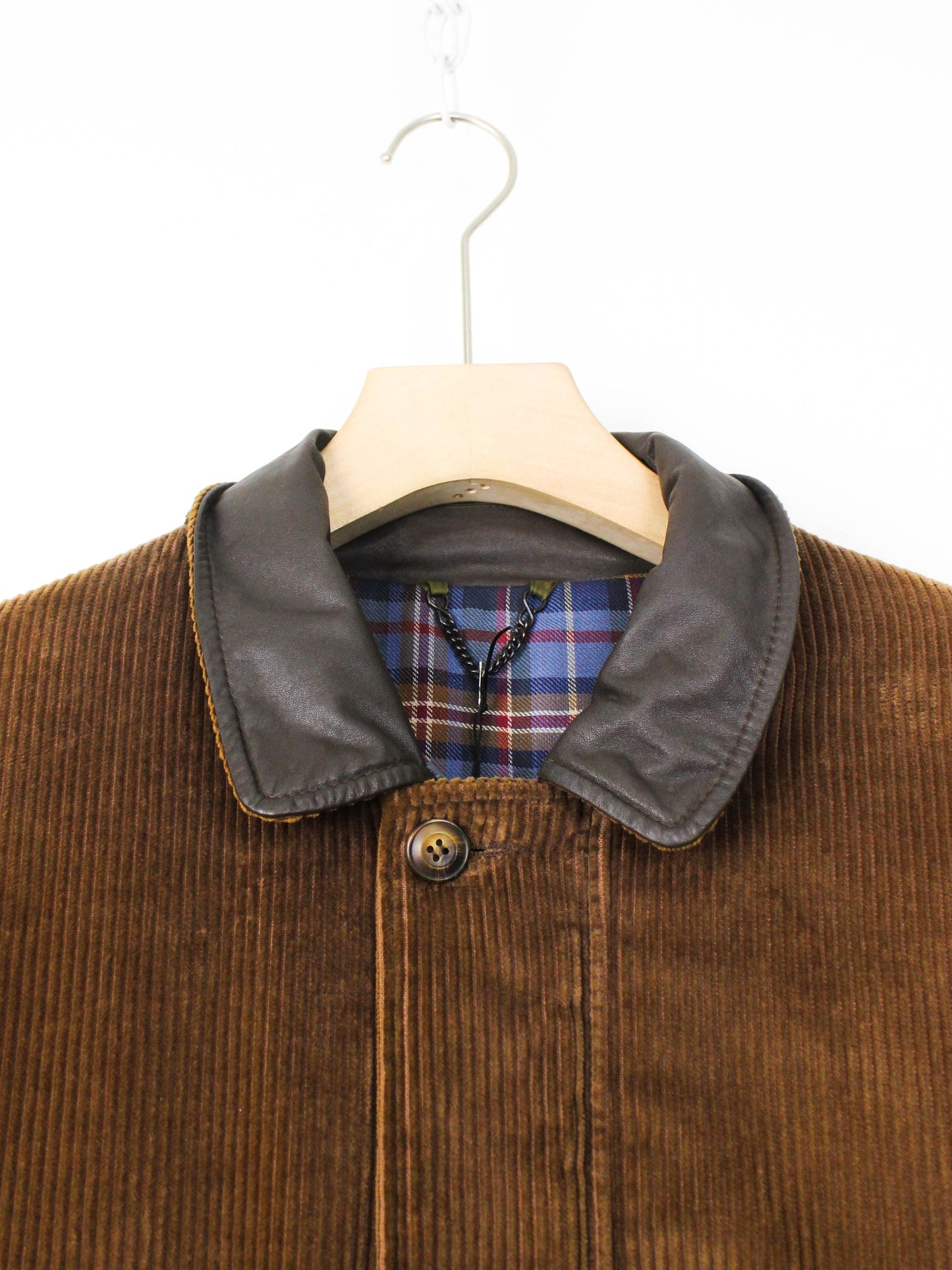 Коричнева вельветова куртка з вовняною підкладкою