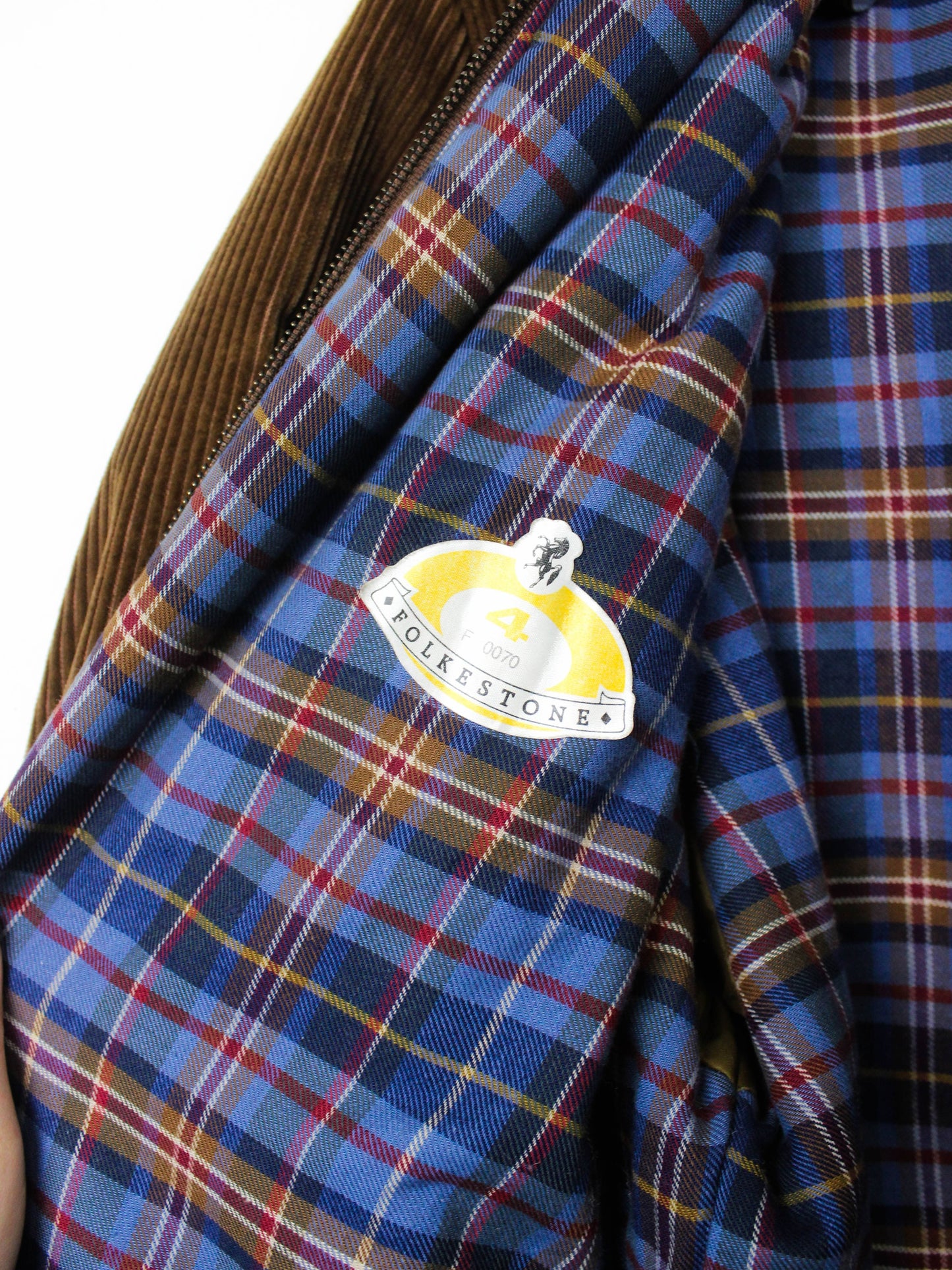 Коричнева вельветова куртка з вовняною підкладкою