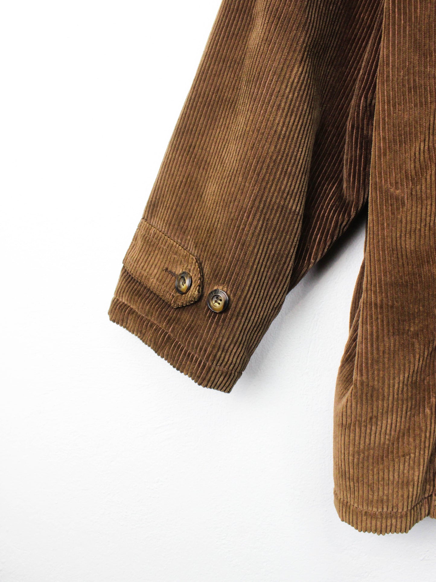 Коричнева вельветова куртка з вовняною підкладкою