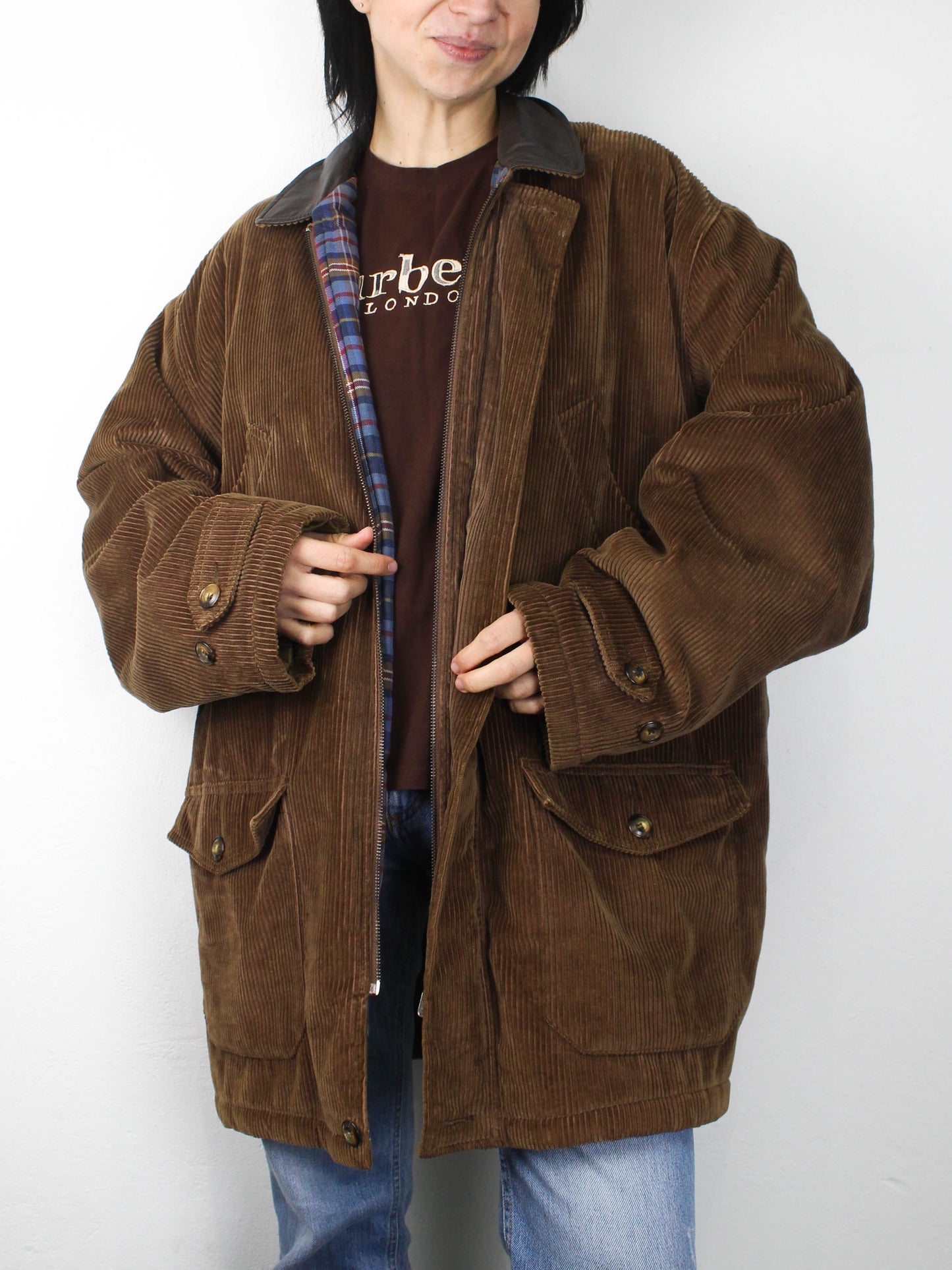 Коричнева вельветова куртка з вовняною підкладкою