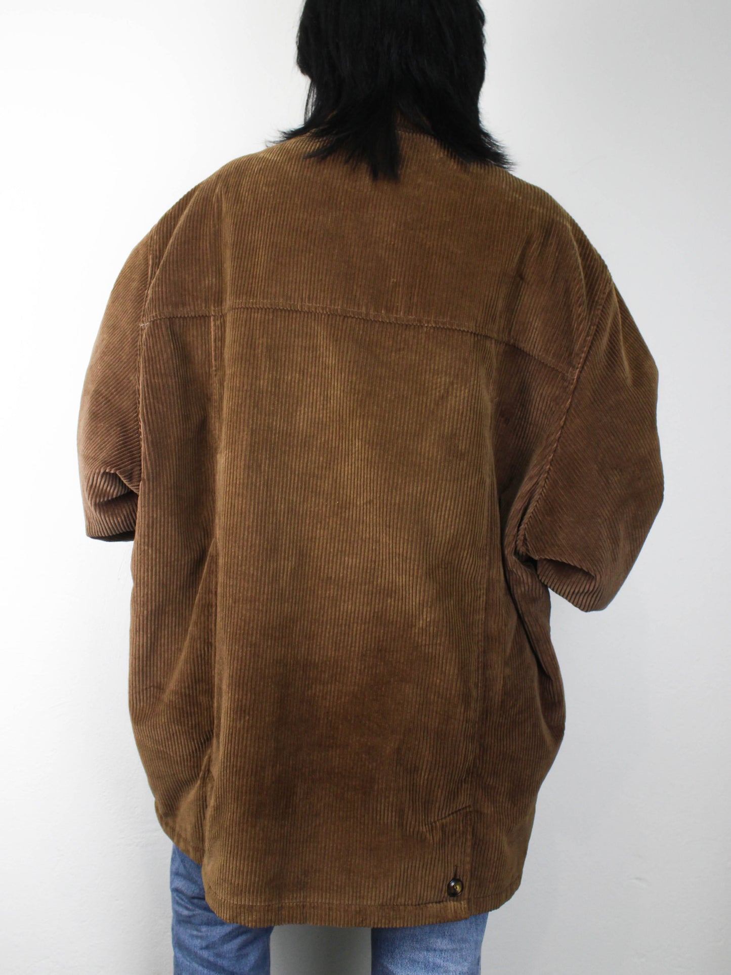 Коричнева вельветова куртка з вовняною підкладкою