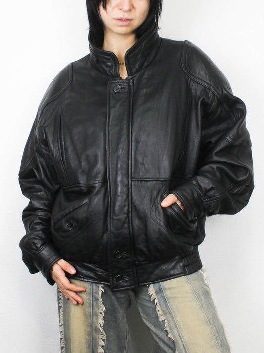 Чорна вінтажна шкірянка із  ґудзиками