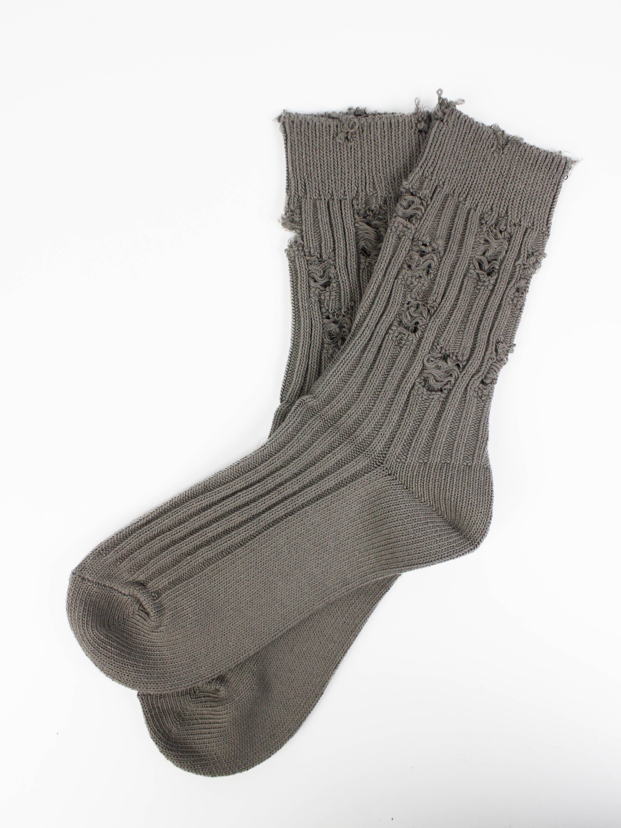 Сірі/білі шкарпетки із рваностями