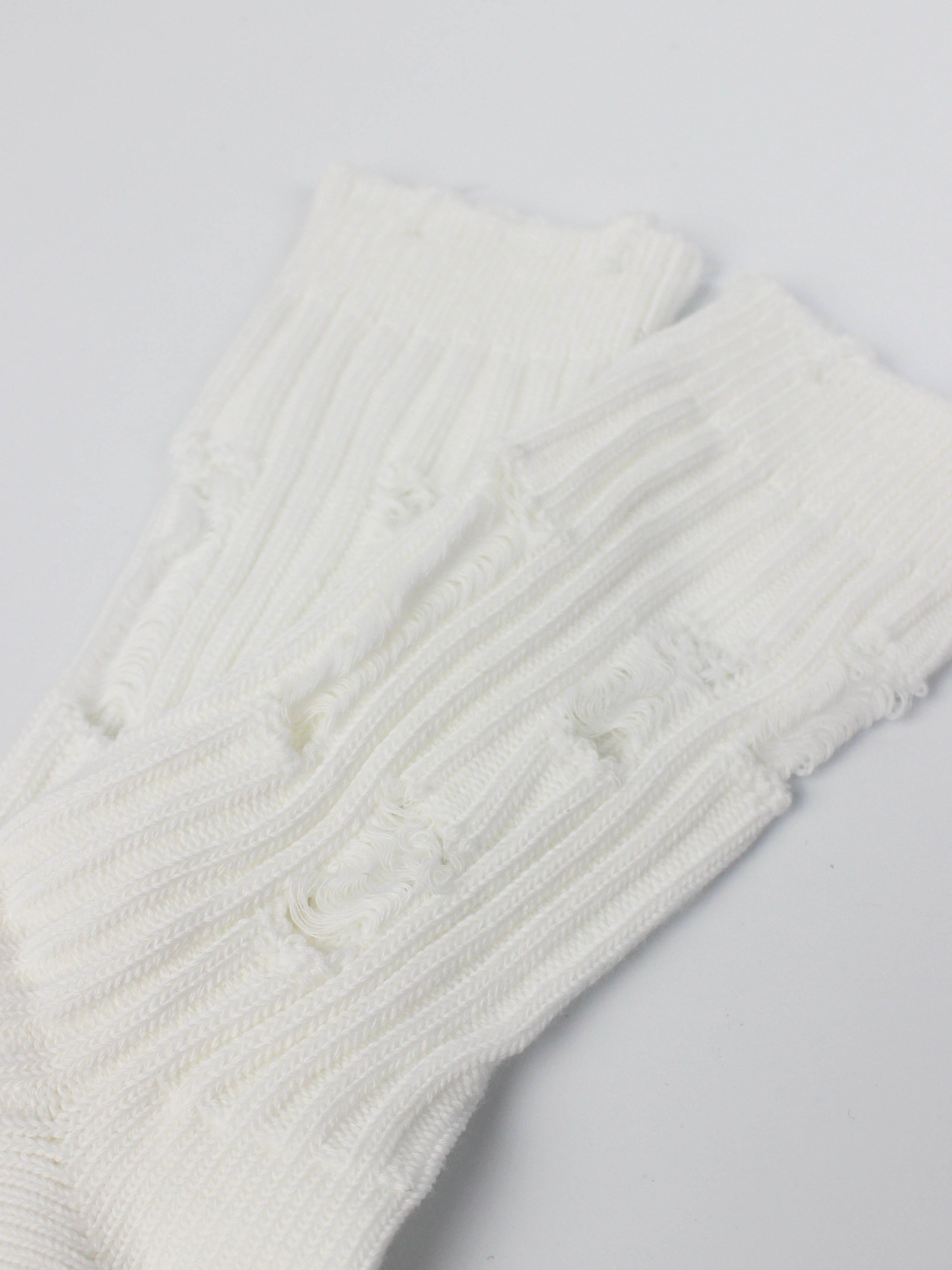 Сірі/білі шкарпетки із рваностями