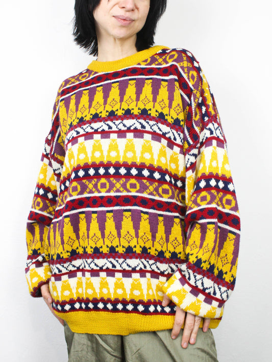 Яскравий светрик із абстрактним візерунком