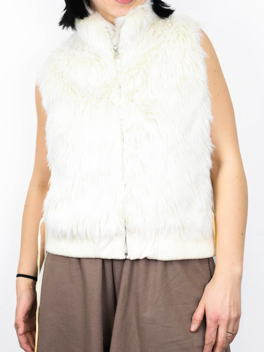Пухнаста жилетка із корсетними зав'язками