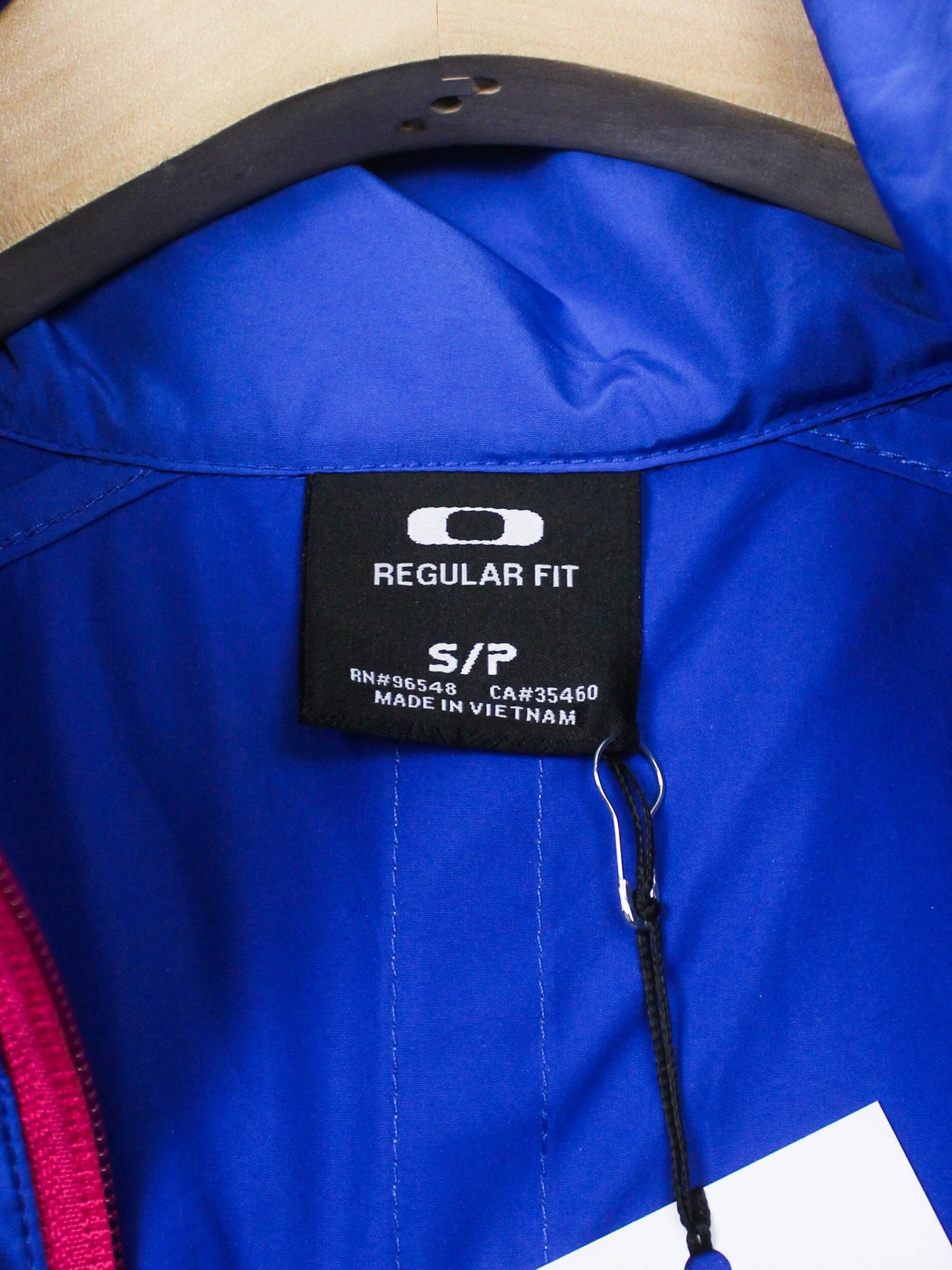 Блакитна вітровка Oakley