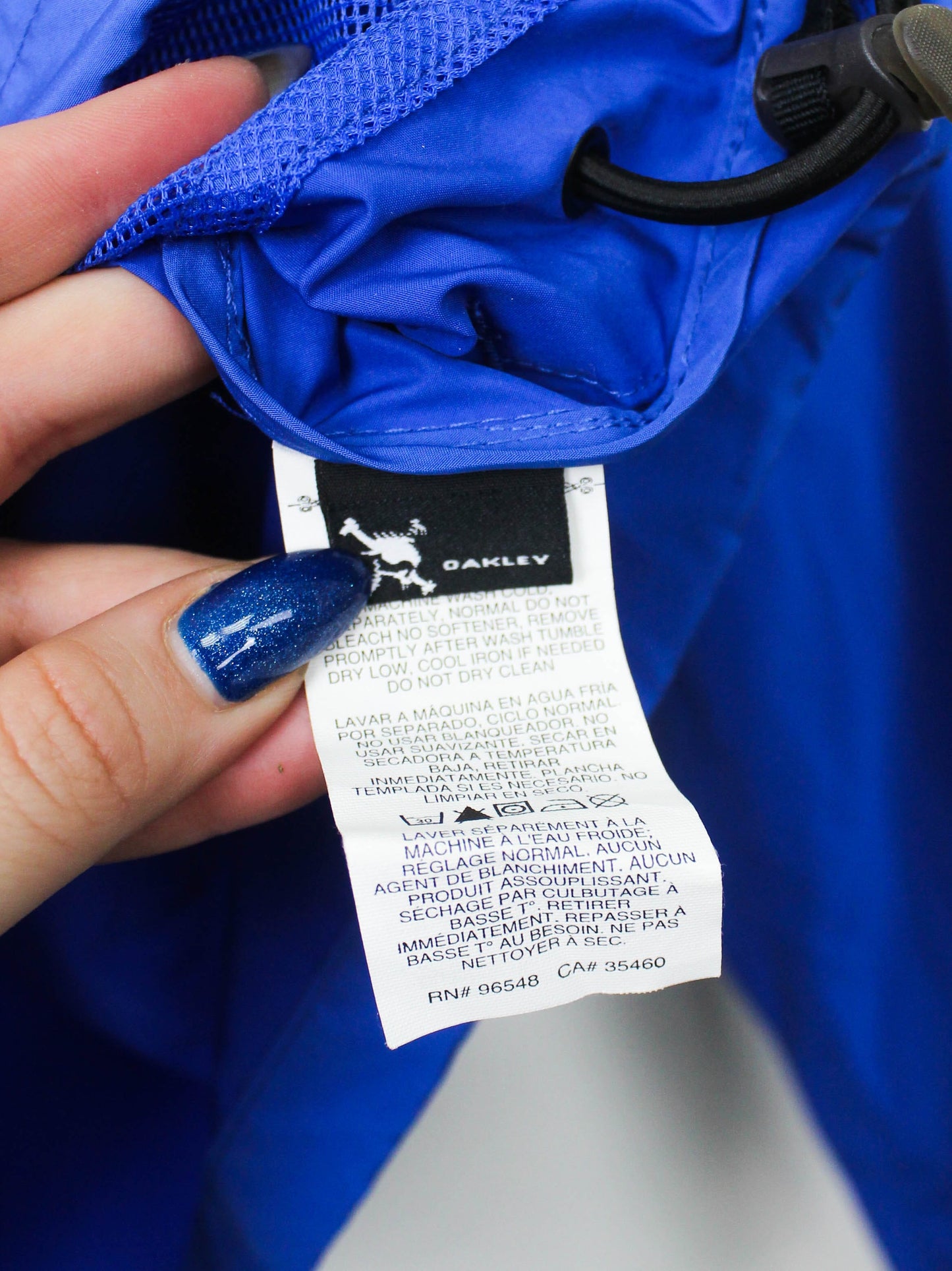 Блакитна вітровка Oakley