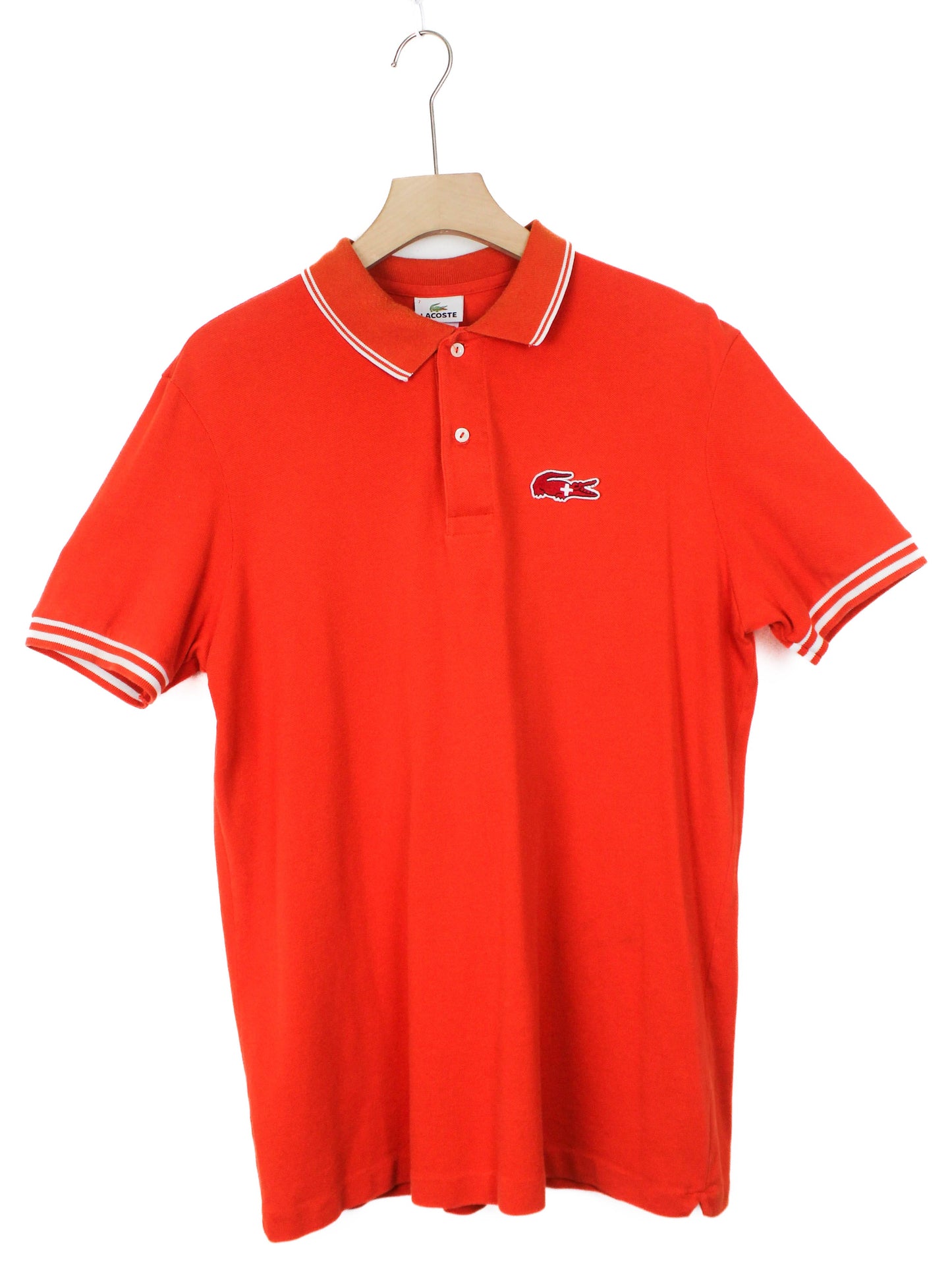 Помаранчеве поло Lacoste