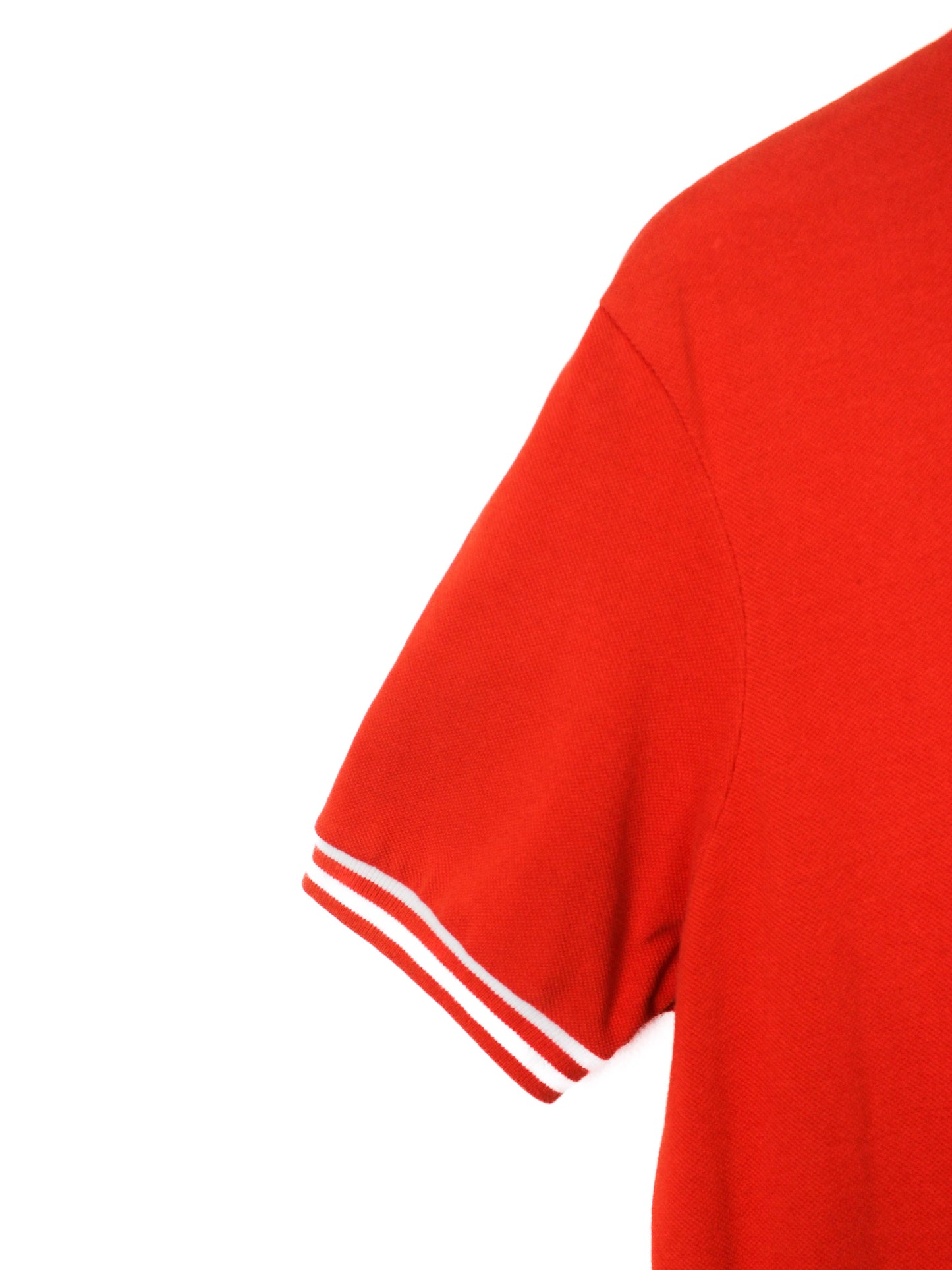Помаранчеве поло Lacoste