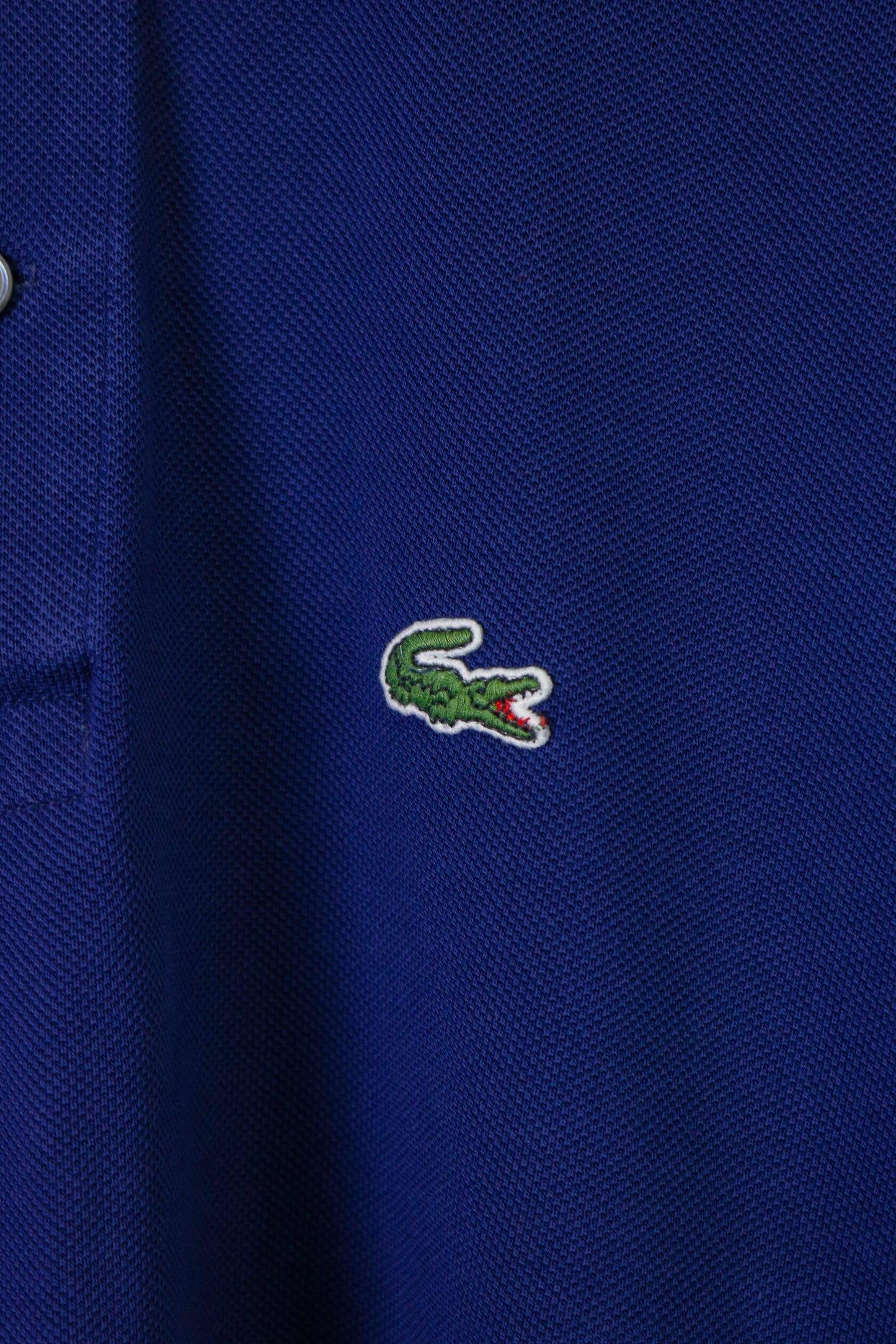 Блакитне поло Lacoste