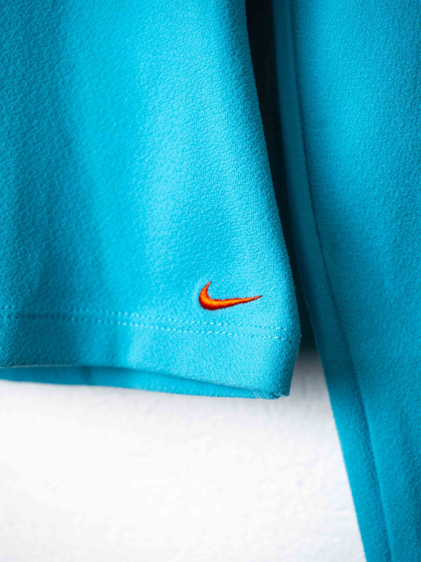 Бірюзовий вінтажний лонгслів Nike