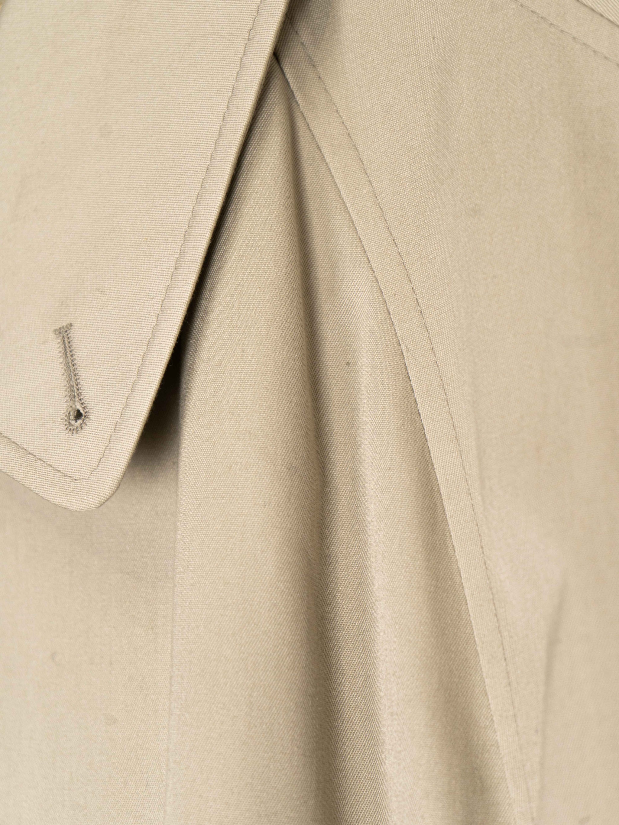 Бежевий дощовик на змійці