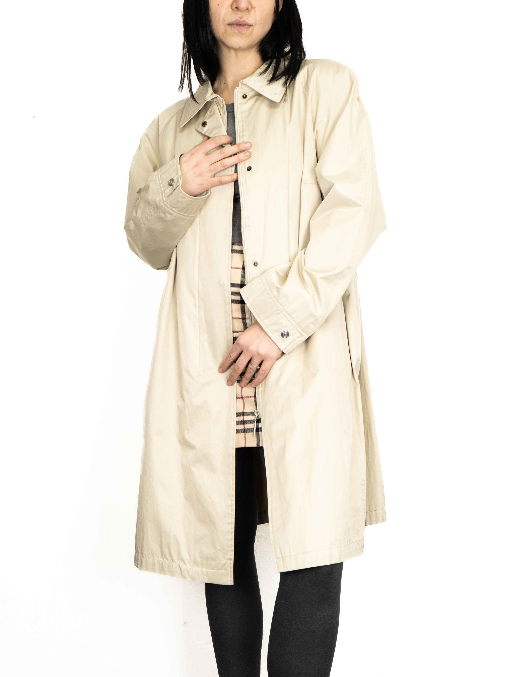 Бежевий дощовик на змійці